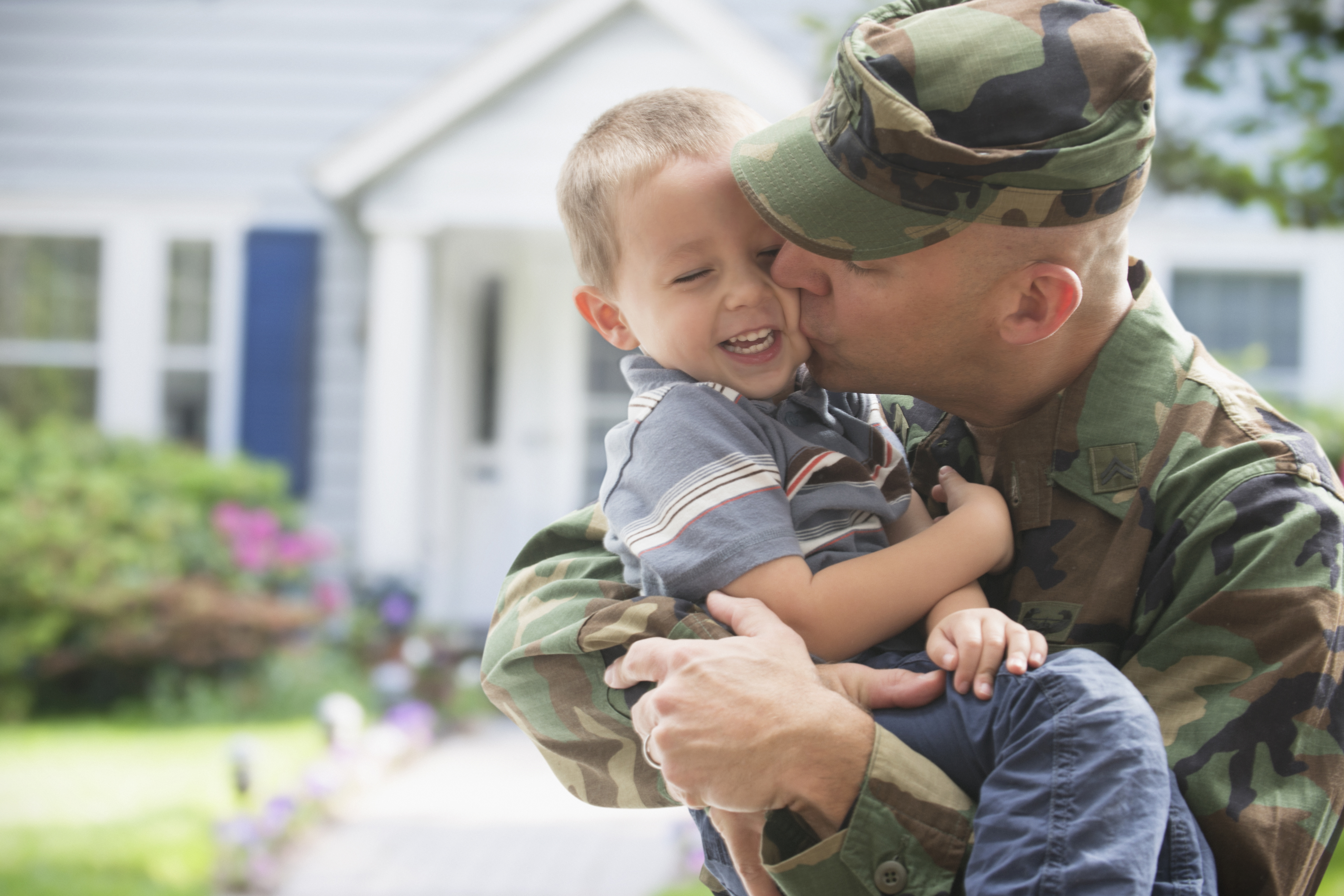 Man in uniform with kid